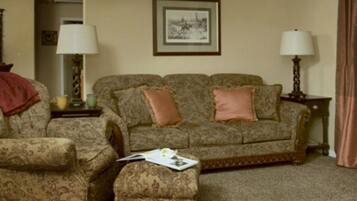 Room, Private Bathroom (The Meritage Cottage) | Living area | Flat-screen TV, DVD player, books