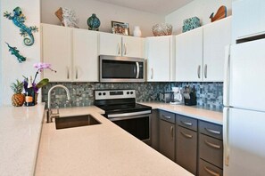 Fridge, microwave, oven, stovetop - NP B5 OceanFront Condo w Ocean Views AC Pool (Lahaina)