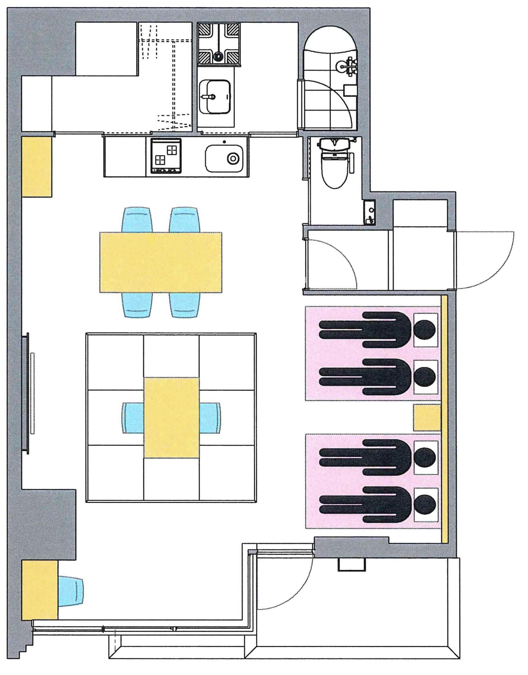 A hotel room layout with a bed, two seating areas, a bathroom, and a kitchenette.
