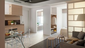 Un apartamento moderno con cocina, comedor y sala de estar.