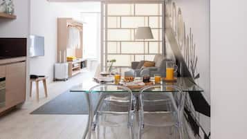 Apartment, 1 Bedroom | Living area | Flat-screen TV