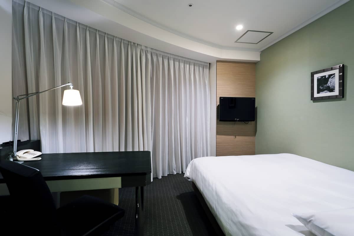 Corner Double Room, Non Smoking, Upper Floor | 1 bedroom, down comforters, minibar, blackout drapes