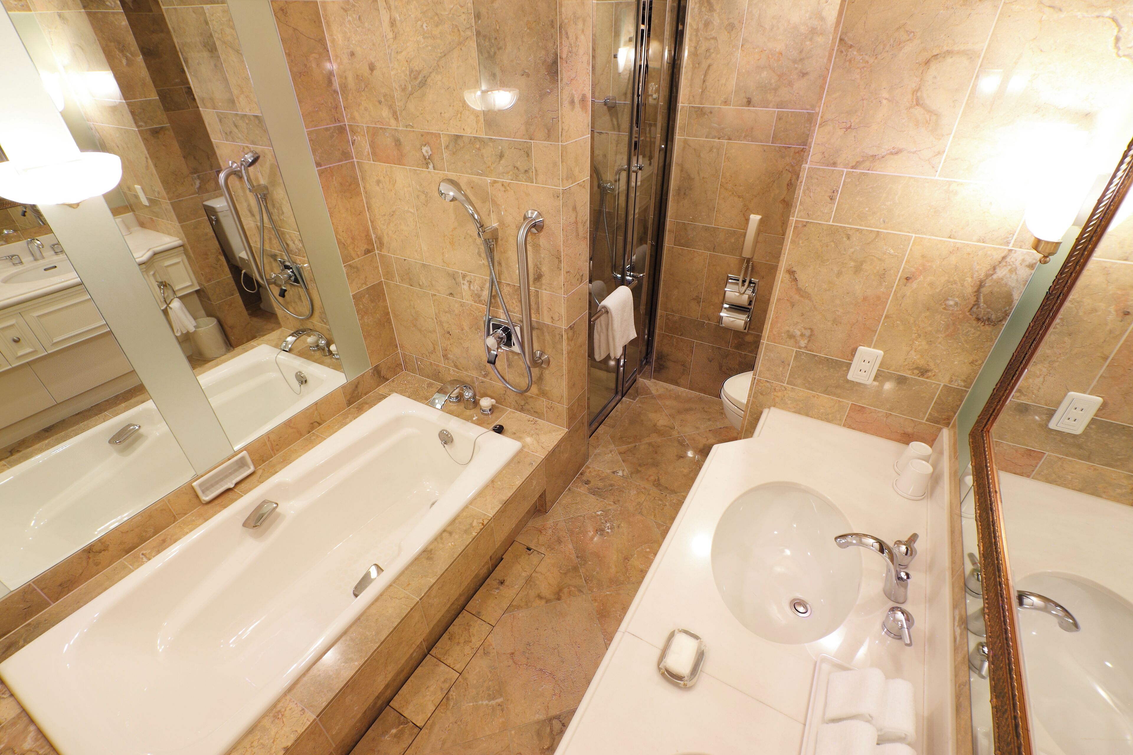 royal suite, non smoking | bathroom | combined shower/bathtub, free toiletries, hair dryer, slippers