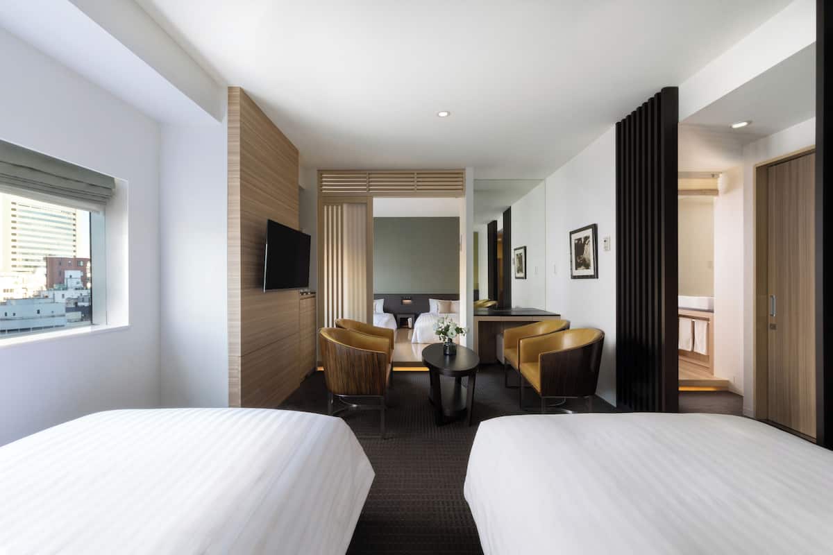 Family Room, 4 Bedrooms, Non Smoking | Down comforters, minibar, desk, laptop workspace