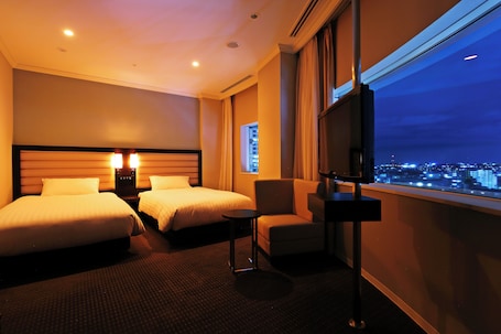 Suite, Non Smoking, City View | 1 bedroom, down comforters, minibar, desk