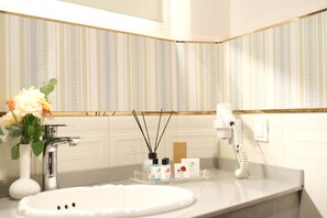 Shower, free toiletries, hair dryer, slippers