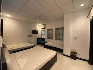 Desk, bed sheets - Seacoast Inn (Baler)
