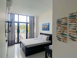 Desk, bed sheets - Seacoast Inn (Baler)