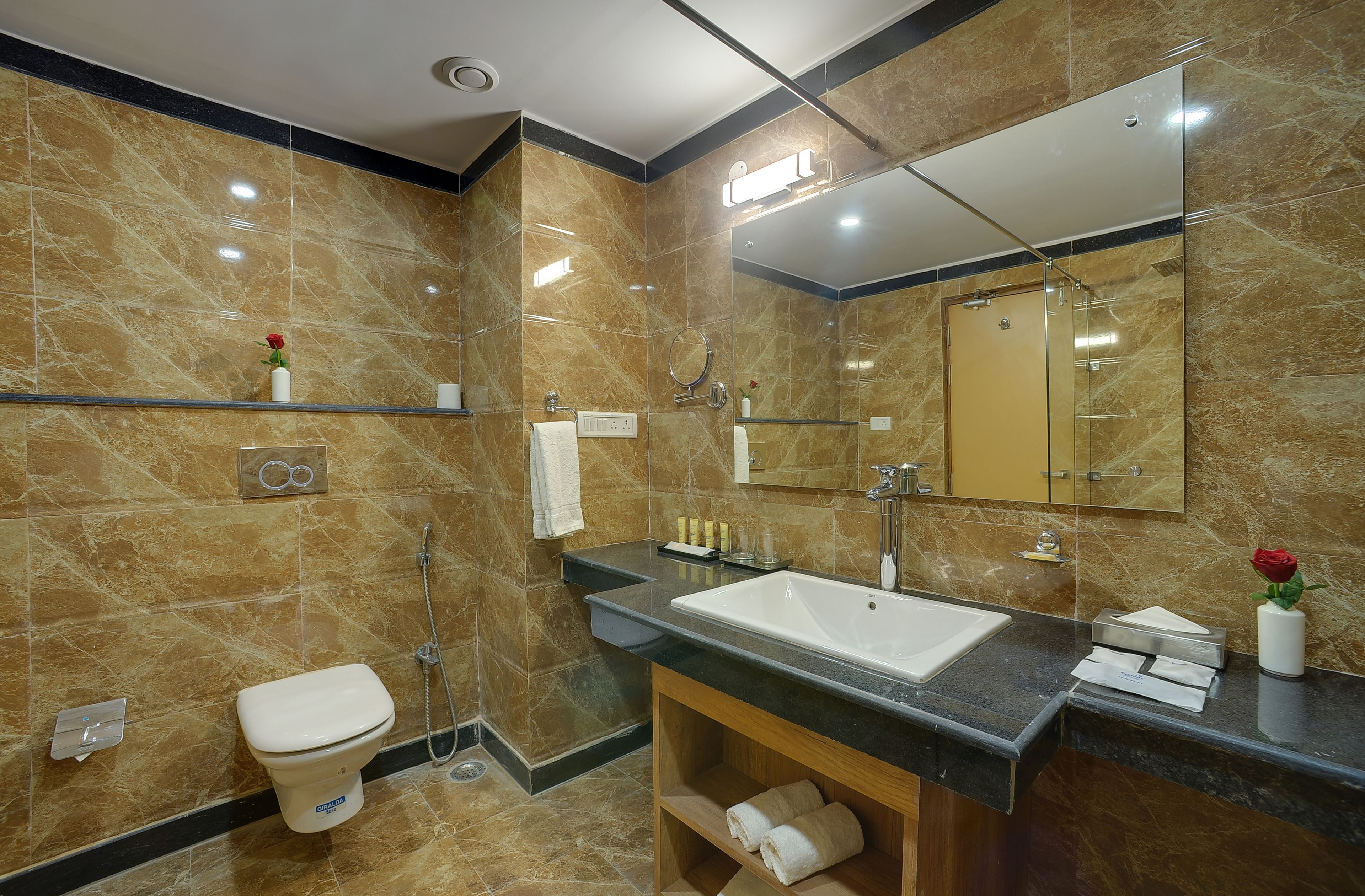 shower, free toiletries, slippers, towels