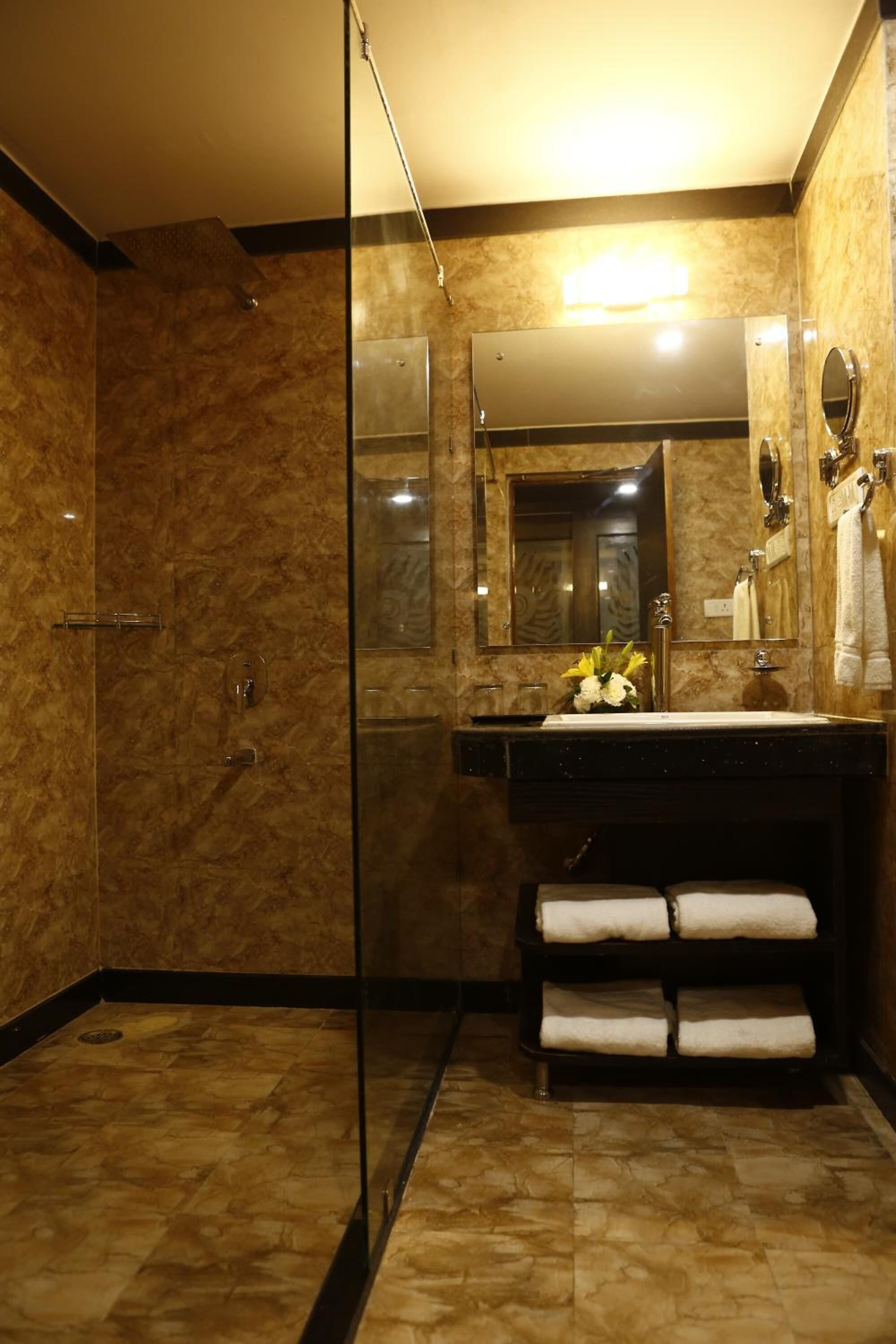 shower, free toiletries, slippers, towels