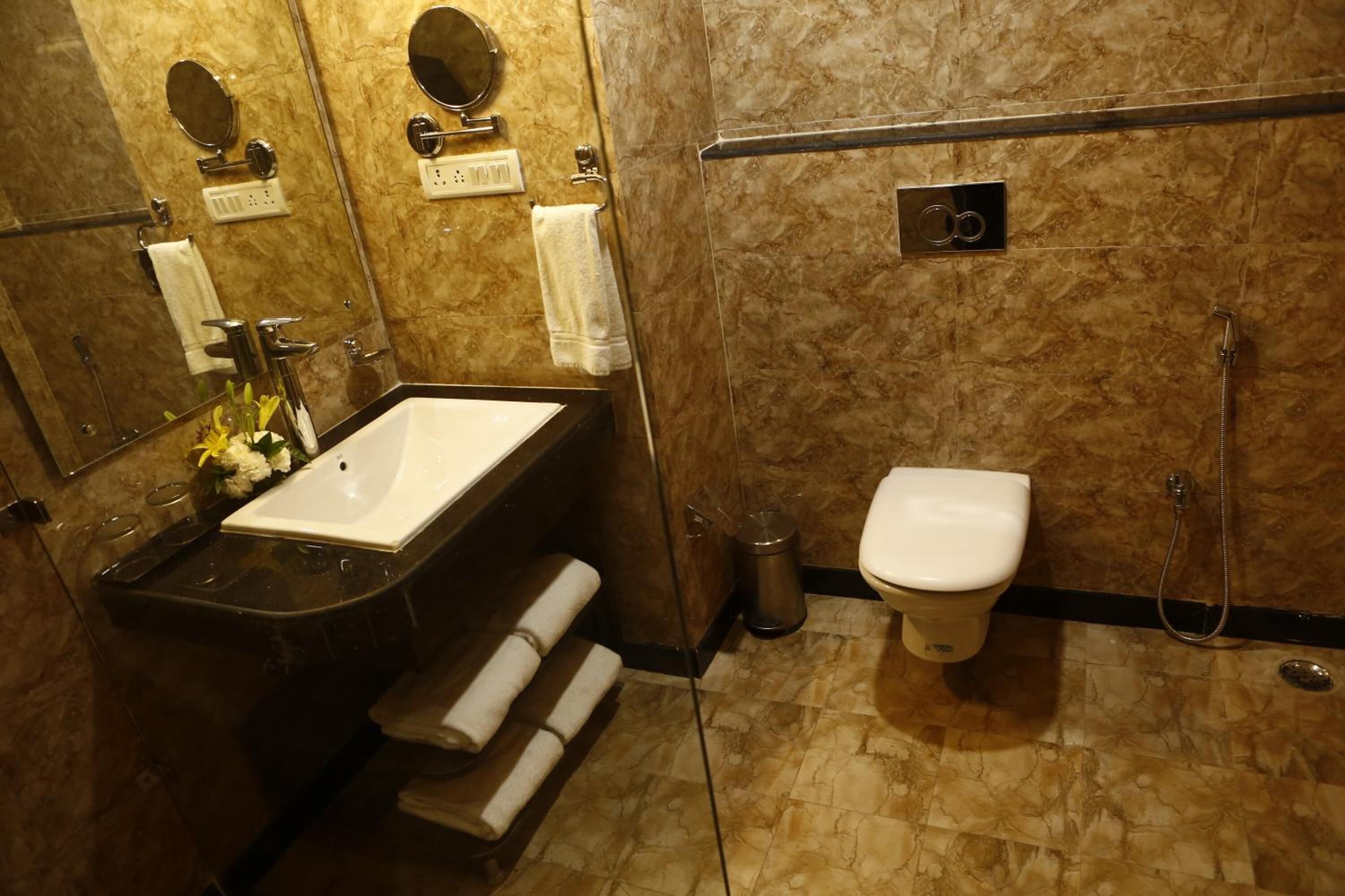 shower, free toiletries, slippers, towels