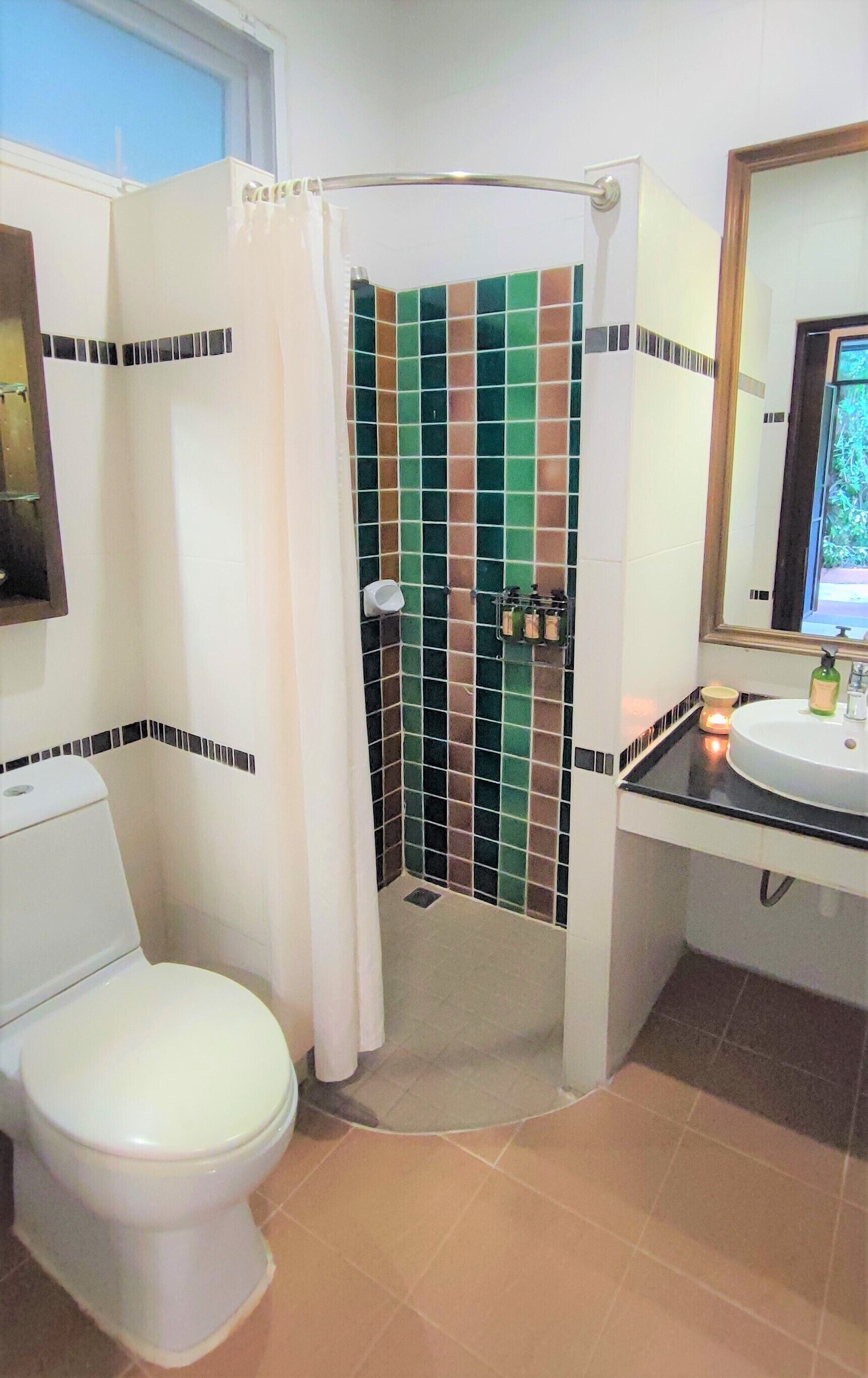 superior garden view room | bathroom | shower, free toiletries, hair dryer, towels
