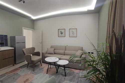 Apartment | Living area | Flat-screen TV, fireplace