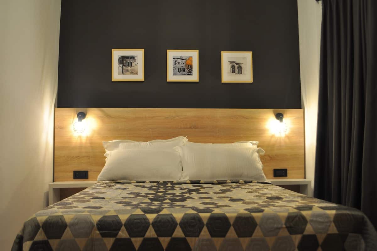 Economy Double Room | Minibar, desk, laptop workspace, soundproofing