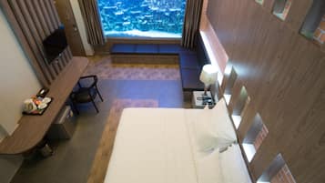 Aquarium Suite, 1 King Bed | Literie de qualité supérieure, surmatelas