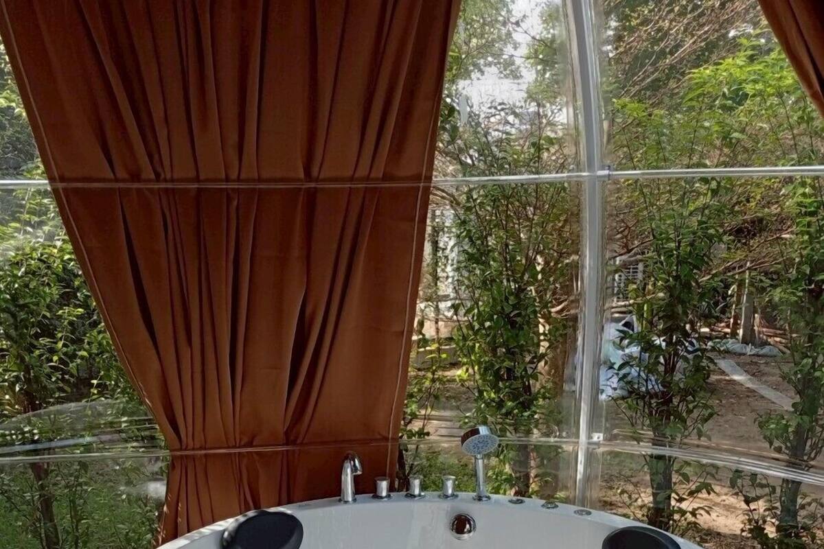 Dome Suite | Bathroom | Separate tub and shower, deep soaking tub, rainfall showerhead