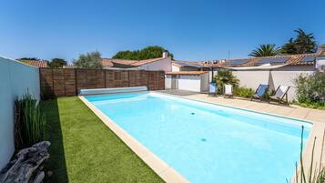 2 outdoor pools, pool umbrellas, pool loungers