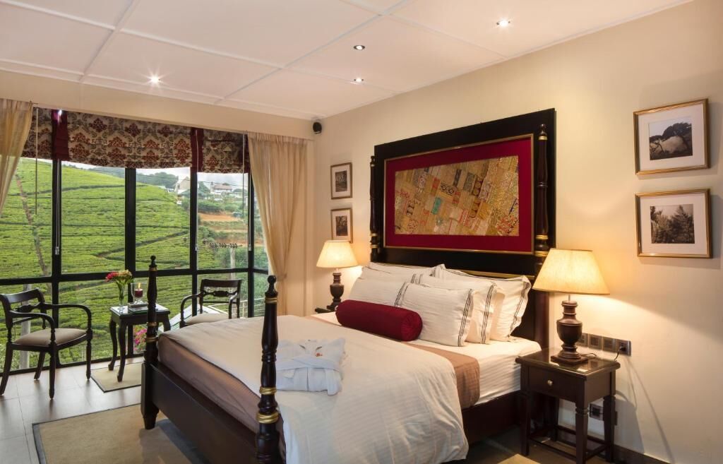 Kamar Deluks, 1 Tempat Tidur King, pemandangan gunung, tepi gunung | 1 kamar tidur, seprai katun Mesir, seprai premium, dan minibar