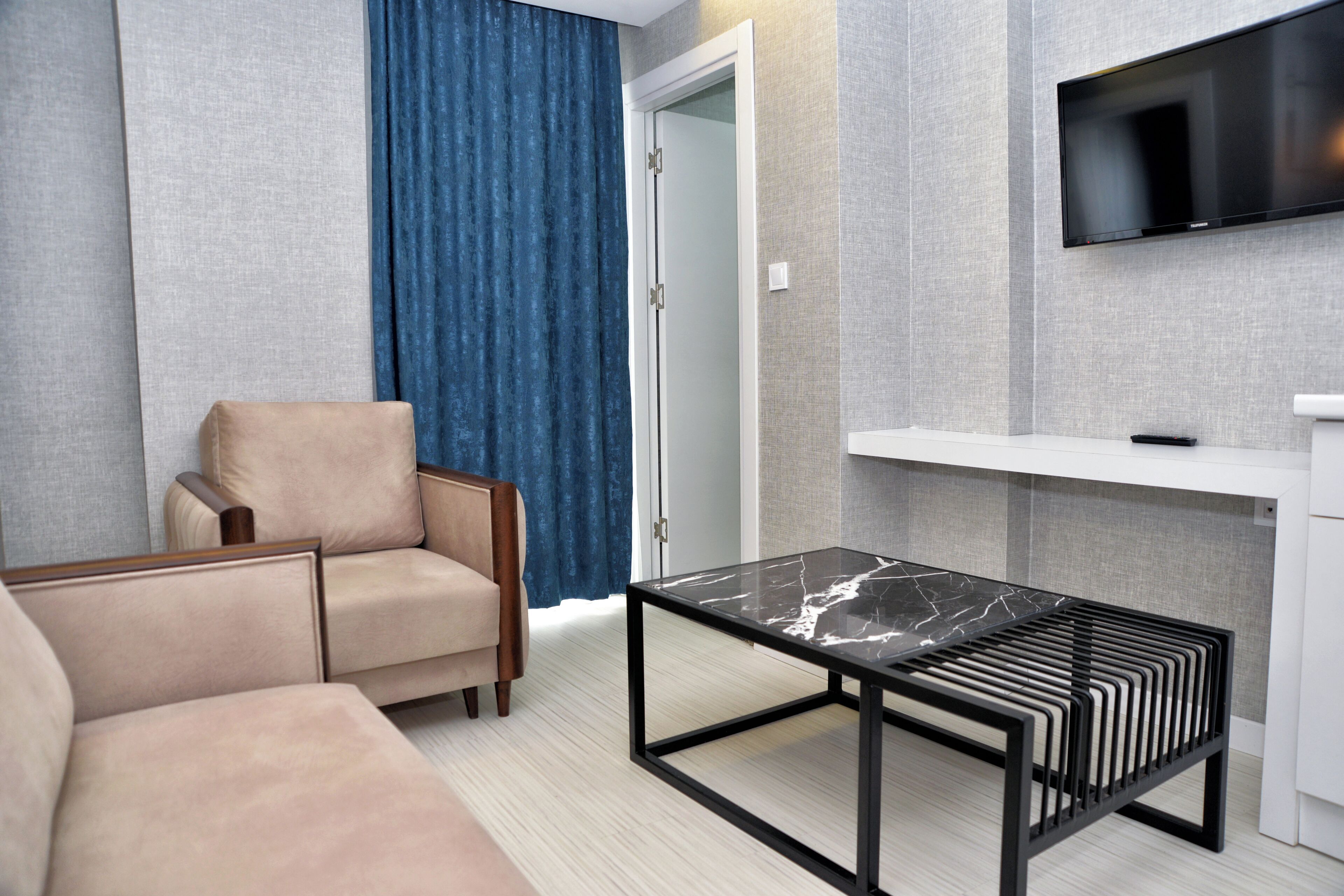 standard suite, 1 bedroom | living area | flat-screen tv