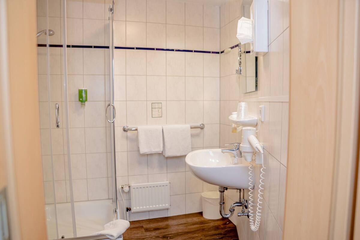classic double room single use, 2 single beds | bathroom | shower, hair dryer, towels, soap