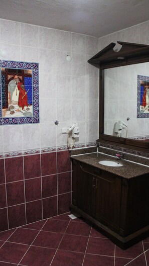 Shower, free toiletries, hair dryer, slippers