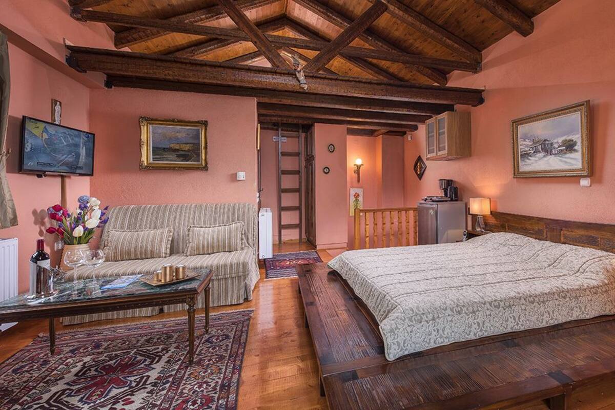 Quarto casal luxo | Área de estar | TV LCD