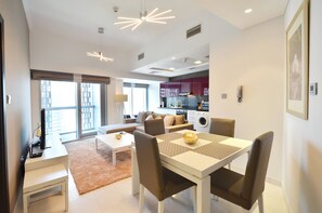 Appartement, 1 chambre | Coin séjour | Télévision LED