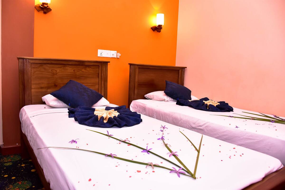 Kamar Triple Deluks | 1 kamar tidur, minibar, setrika/meja setrika, dan Wi-Fi gratis