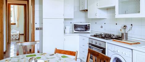 Apartment, 2 Bedrooms (Location: Via Fiume 1) | 2 bedrooms, desk, iron/ironing board, free WiFi