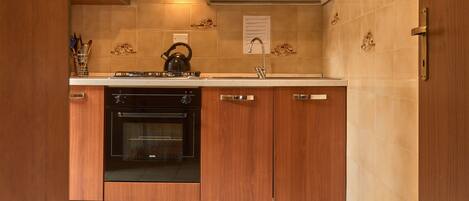 Apartment, 1 Bedroom | Private kitchen | Full-size fridge, microwave, oven, stovetop