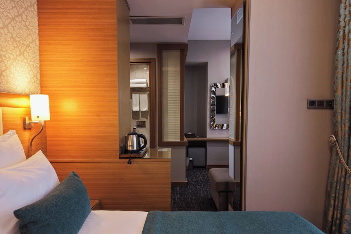 Family Room, 2 Bedrooms | Premium bedding, minibar, in-room safe, desk