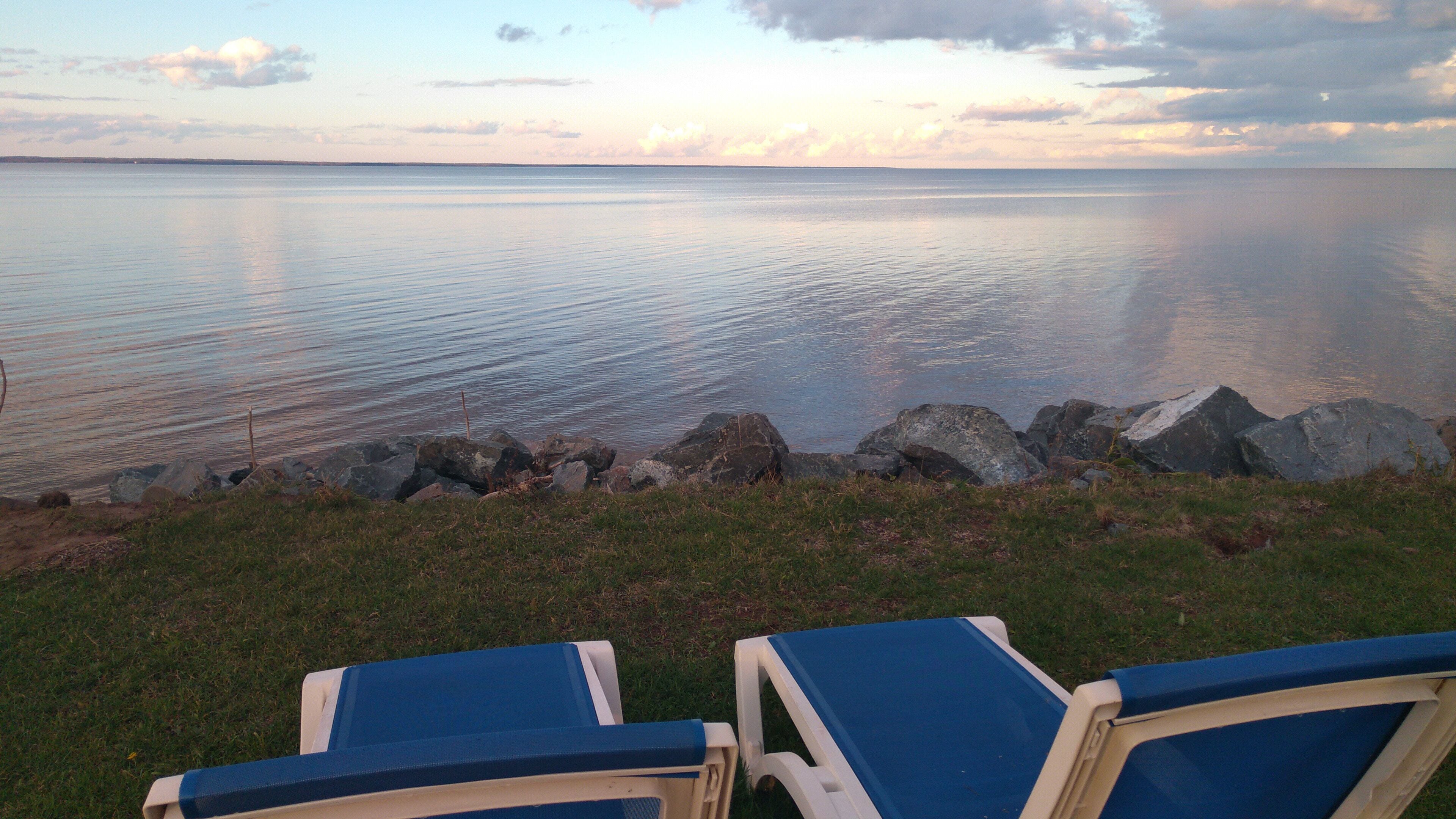 On the beach, sun loungers, beach towels, kayaking