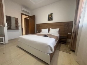 Family Suite, Sea View | Minibar, blackout drapes, iron/ironing board, free WiFi - Hôtel Al Baraka (Fatou)
