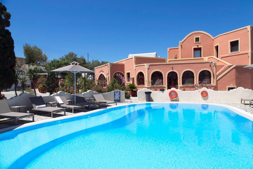 outdoor pool, pool umbrellas, pool loungers