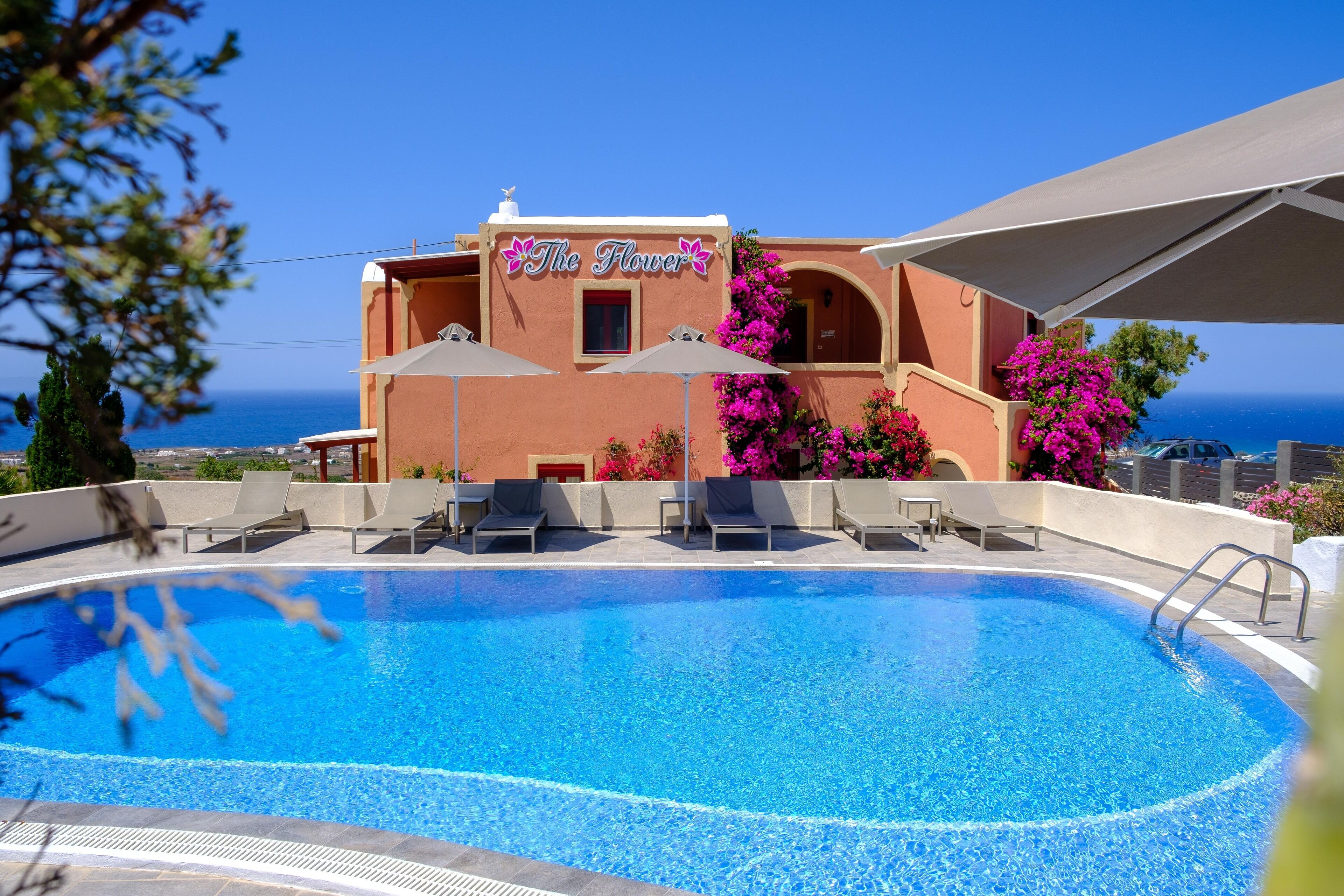 outdoor pool, pool umbrellas, pool loungers