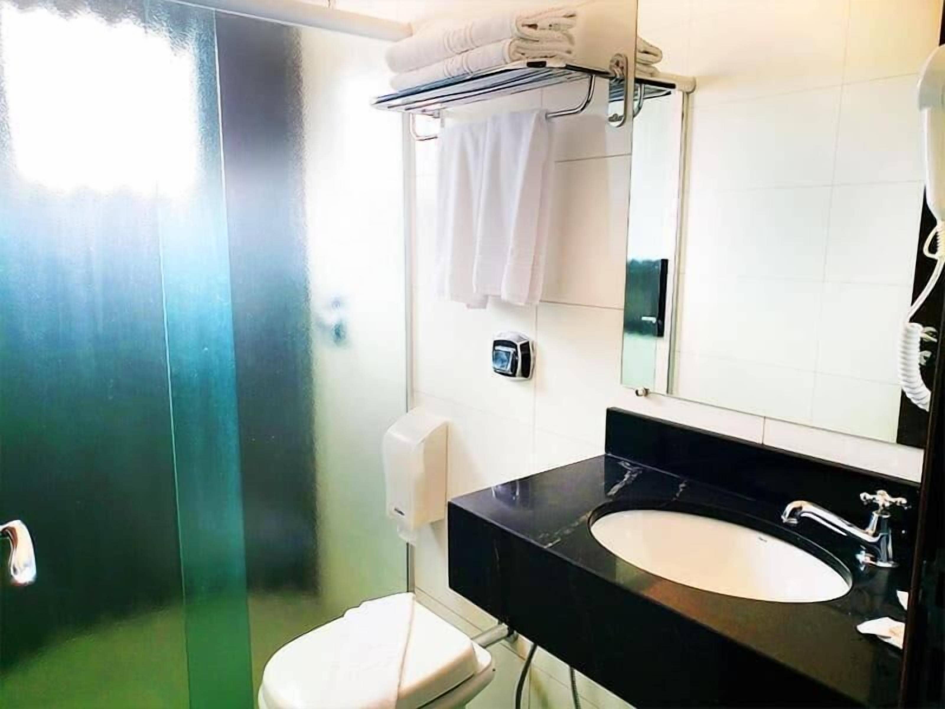deluxe single room, multiple beds | bathroom | shower, free toiletries, hair dryer, towels