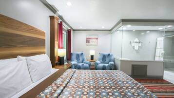 Suite, 1 King Bed, Non Smoking (Jacuzzi Tub) | Rollaway beds, free WiFi, bed sheets