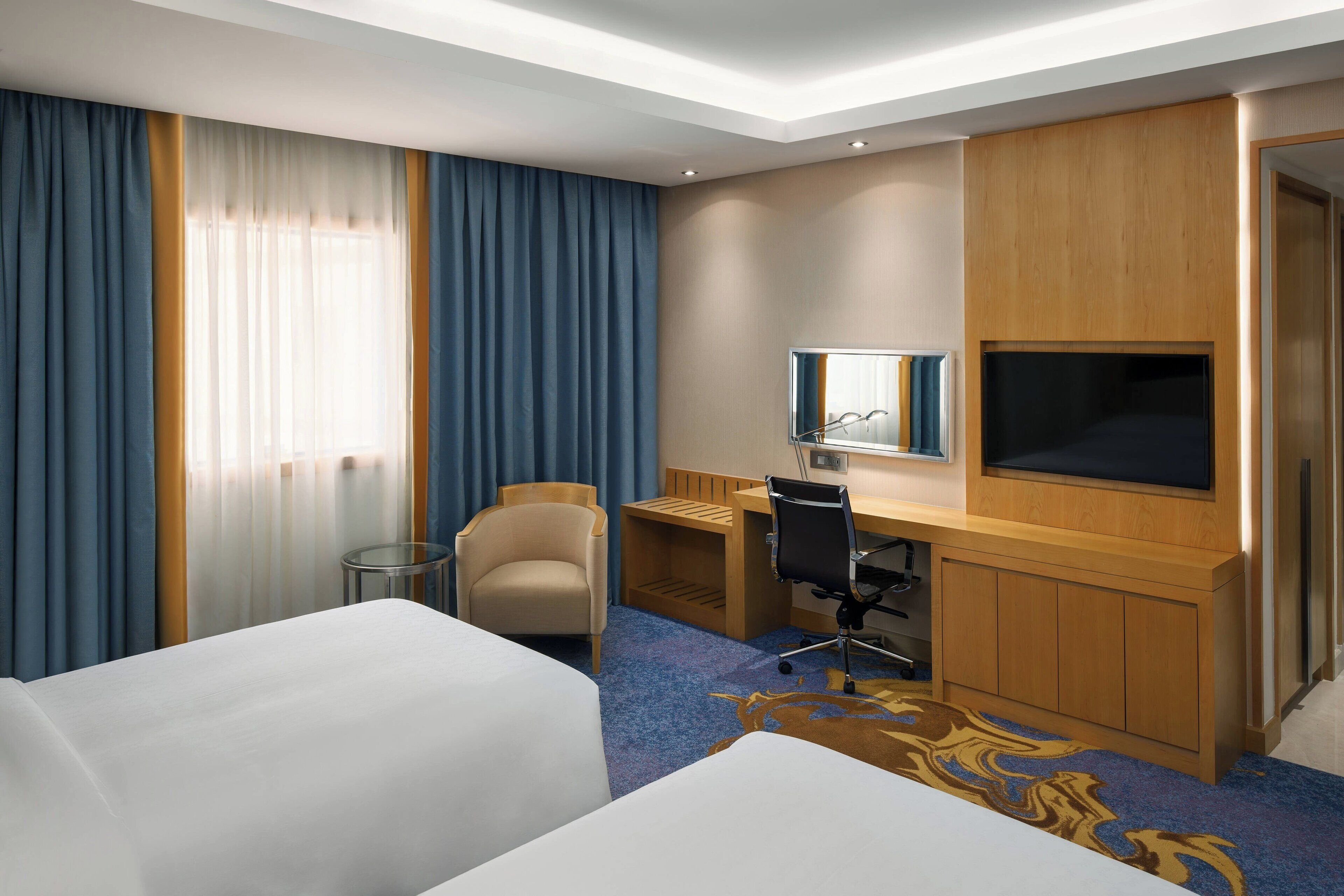 Pillow-top beds, minibar, in-room safe, individually decorated