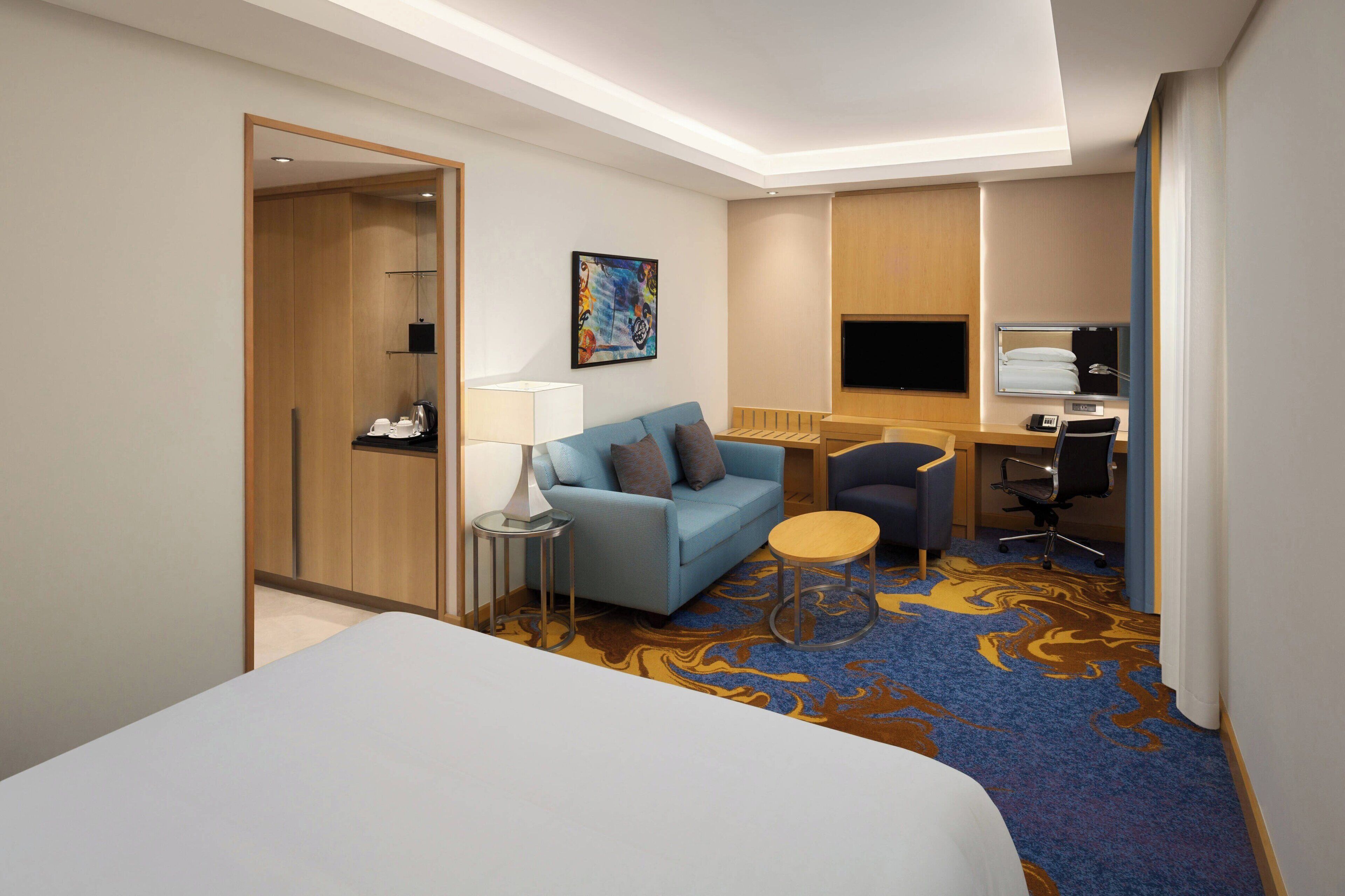 Surmatelas, minibar, coffres-forts dans les chambres