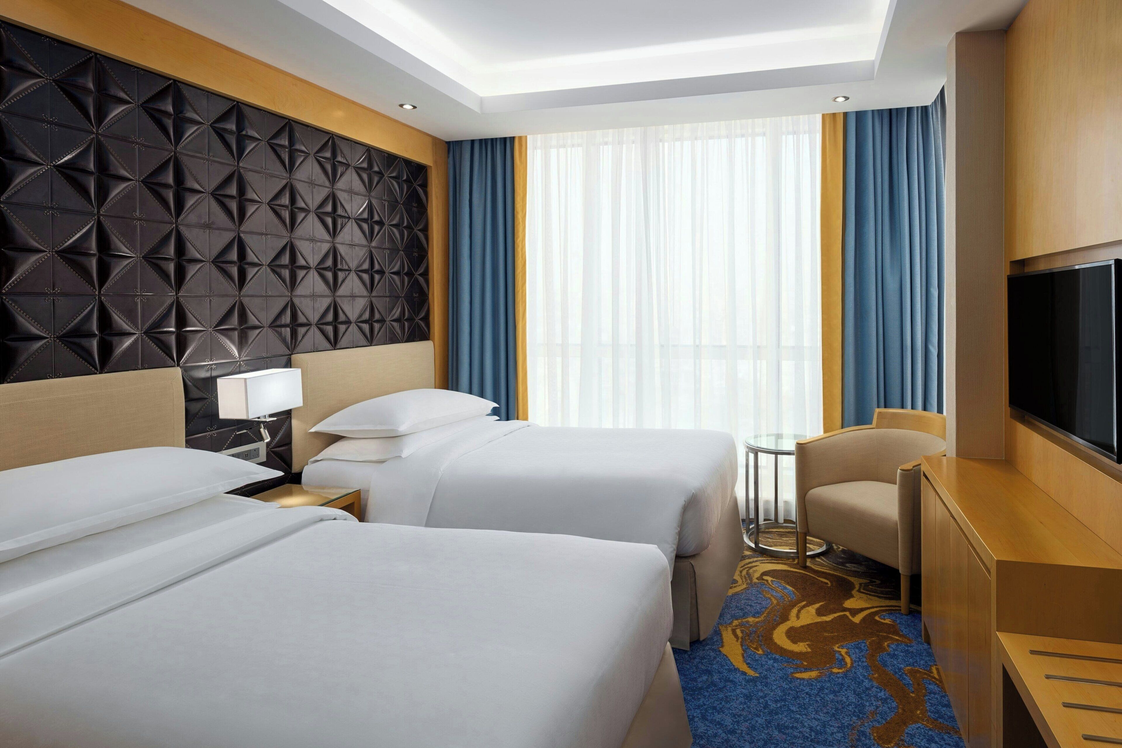 Pillow-top beds, minibar, in-room safe, individually decorated