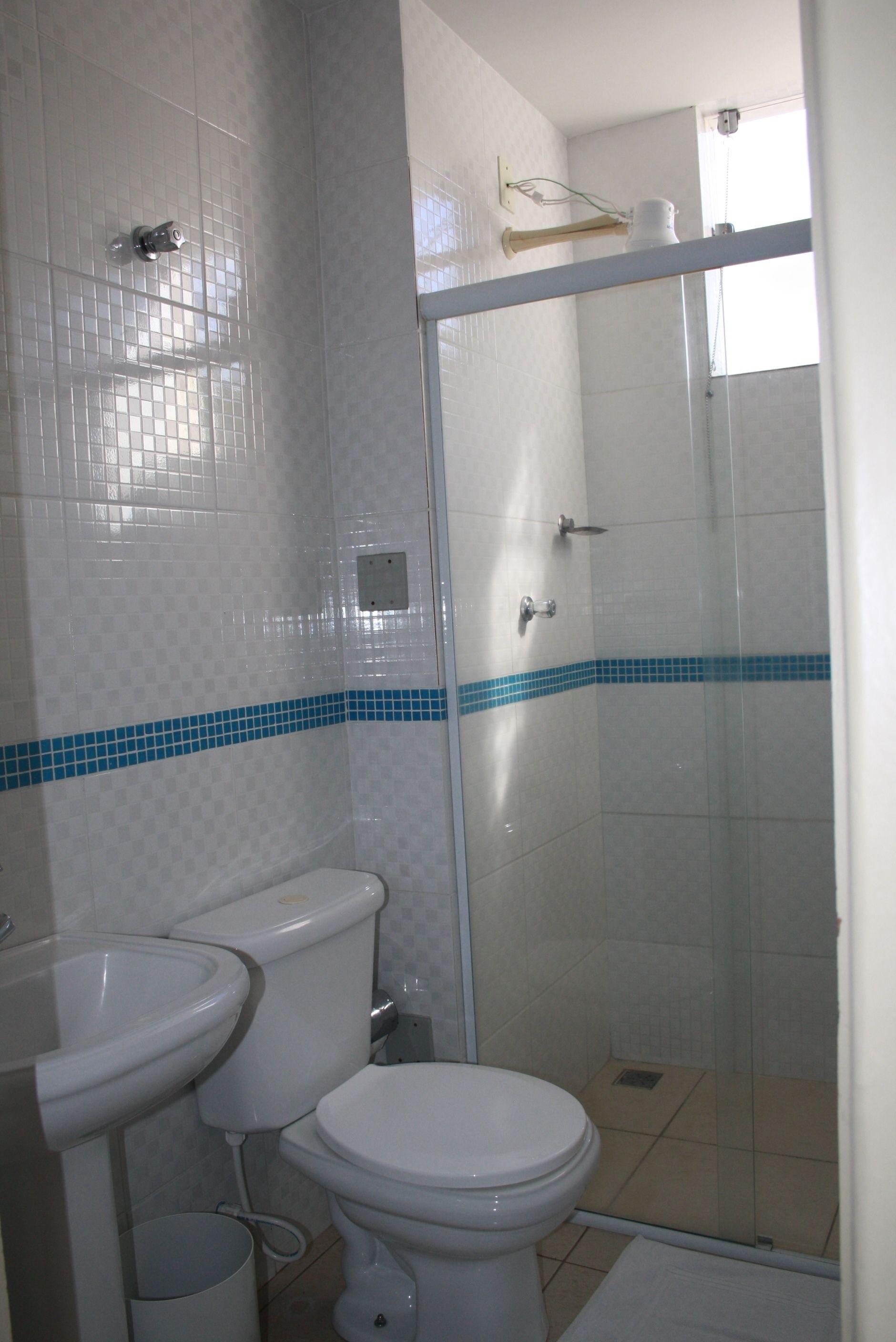 shower, rainfall showerhead, towels, toilet paper