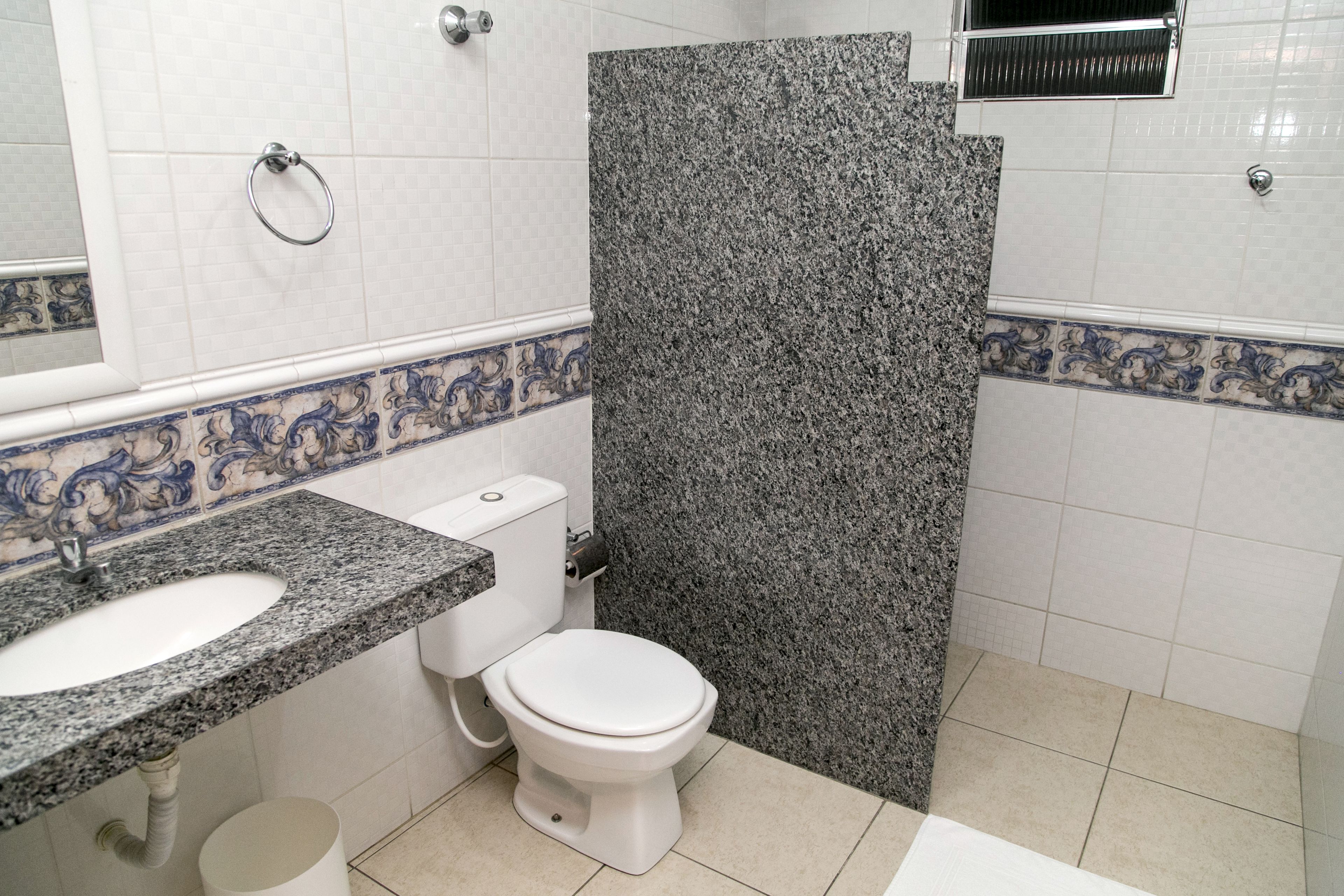 shower, rainfall showerhead, towels, toilet paper