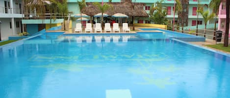 Outdoor pool, open 9:00 AM to 10:00 PM, pool loungers