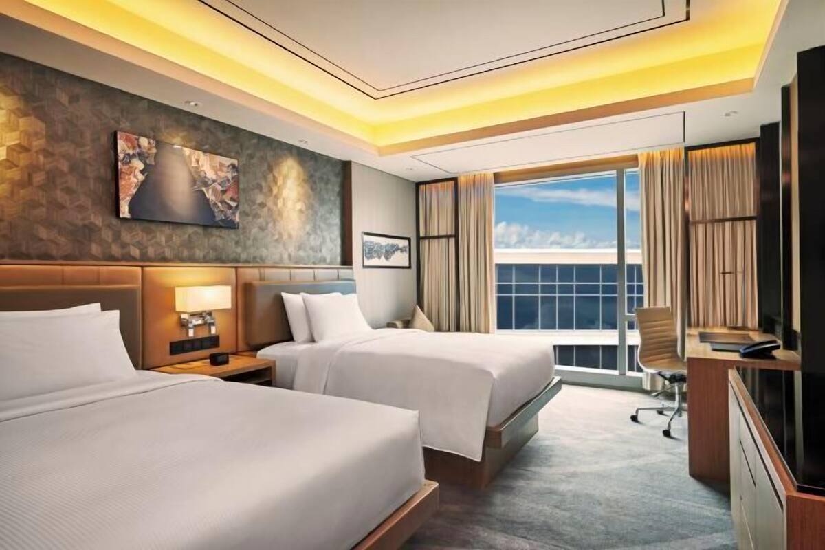 Premium bedding, down comforters, pillowtop beds, minibar