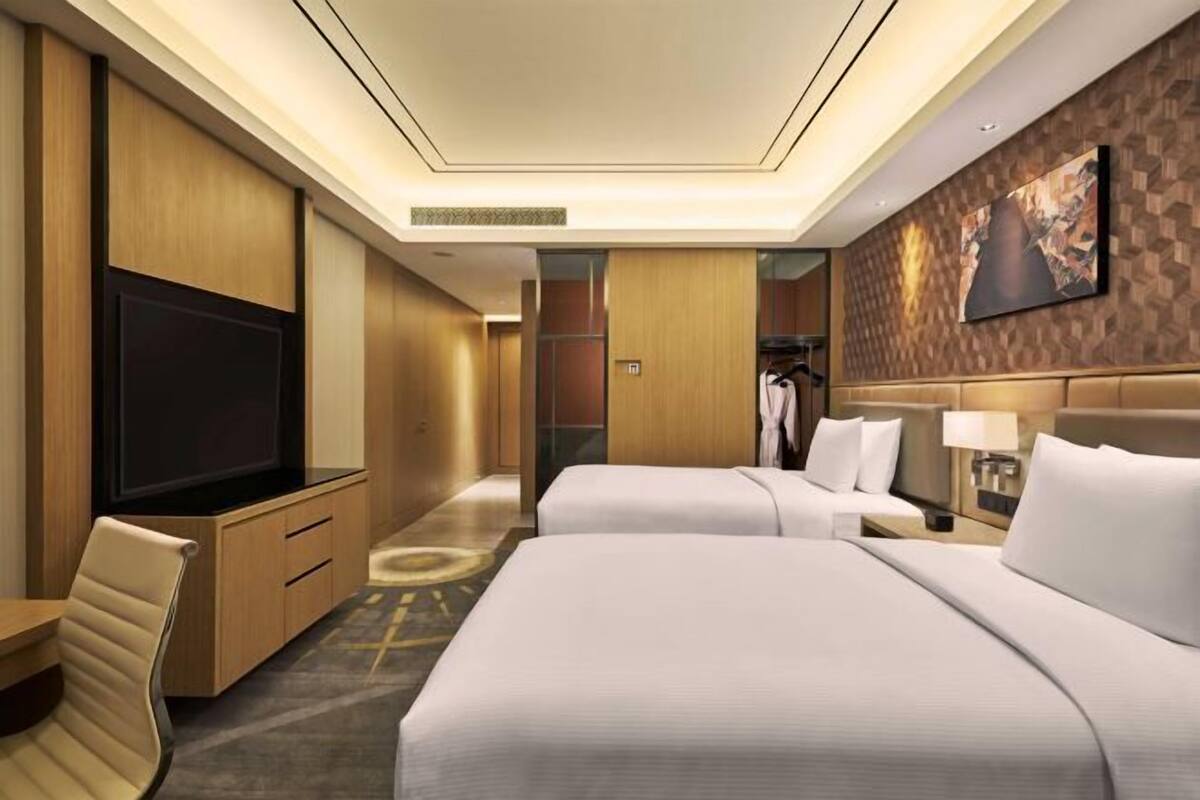 Premium bedding, down comforters, pillowtop beds, minibar