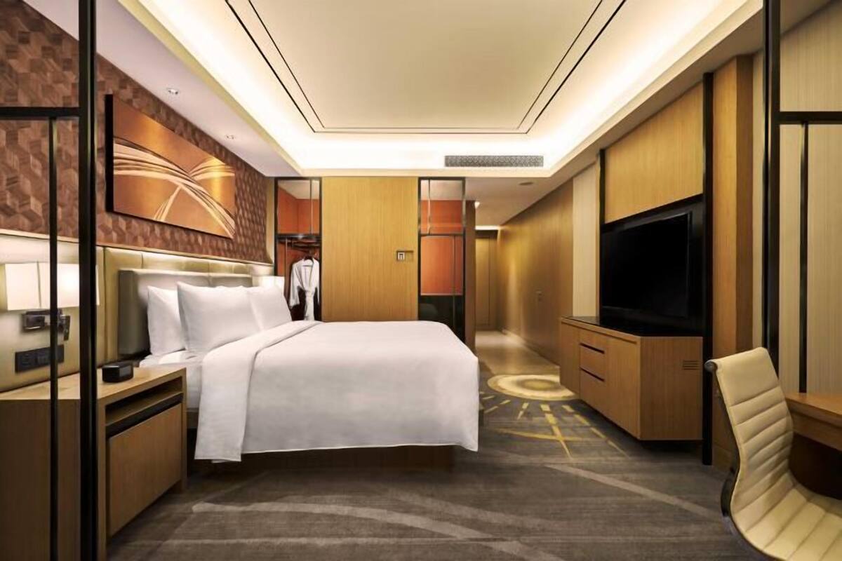 Premium bedding, down comforters, pillowtop beds, minibar