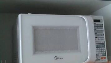 Apartamento conforto, 1 quarto, cozinha, ao lado da piscina | Micro-ondas