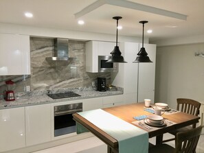 Premium Apartment, 1 Bedroom, Partial Sea View, Sea Facing | Private kitchen | Full-size fridge, microwave, oven, stovetop