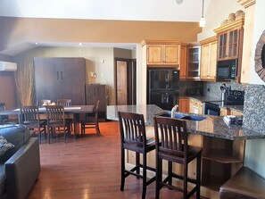Luxury Penthouse, 2 Bedrooms, Balcony, Mountain View | Private kitchen | Full-size fridge, microwave, oven, stovetop