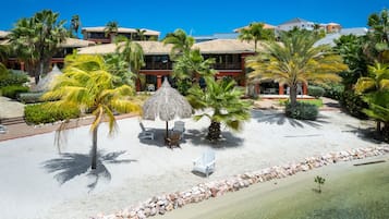 Private beach, white sand, sun loungers, beach towels